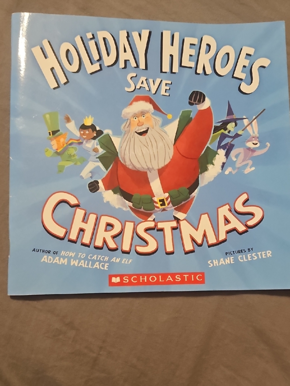 Scholastic Holiday Heroes Save Christmas - Blue & Red Cover